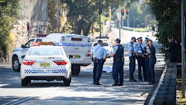 Police on the street in Forest Lodge where Mr McKee died.
