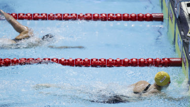 Australia's Ariarne Titmus touches in ahead of United States' Katie Ledecky.