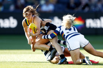 The Magpies’ Alana Porter is tackled.