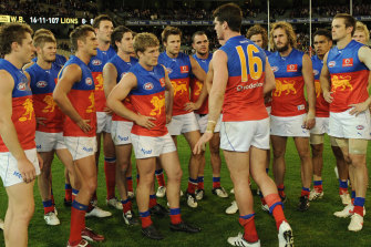 Jonathon Brown talks to his teammates after the loss.