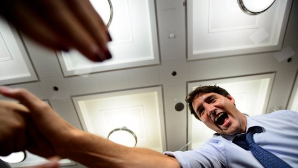 Liberal Leader Justin Trudeau greets the crowd during a campaign stop in Vancouver, British Columbia, on Wednesday.