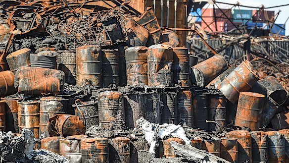 Burnt-out chemical drums after the fire at the West Footscray factory last year.