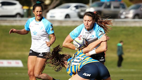 Canberra sevens player Abby Gustaitis in action.