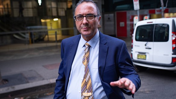 Spiro Stavis leaves the ICAC hearing on Thursday. 