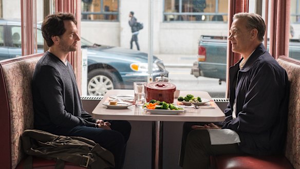 Matthew Rhys plays a journalist interrogating Fred Rogers (Tom Hanks) in A Beautiful Day in the Neighborhood.