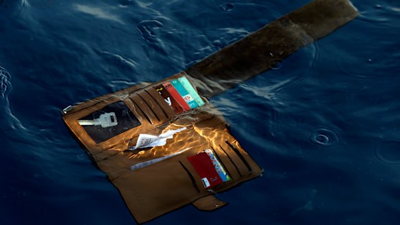 A wallet belonging to a victim of the Lion Air crash floats in the waters of Ujung Karawang, West Java.
