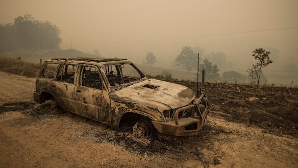 A burnt out vehicle on the fireground in Taylors Arm near Macksville in northern NSW.