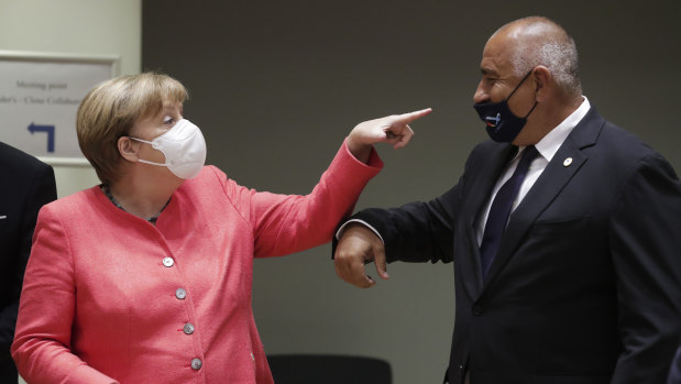 Angela Merkel points to Bulgarian Prime Minister Boyko Borissov's exposed nose at the start of the economic round table. Discussions were tense and the European Union was unable to find a resolution by Sunday evening. 