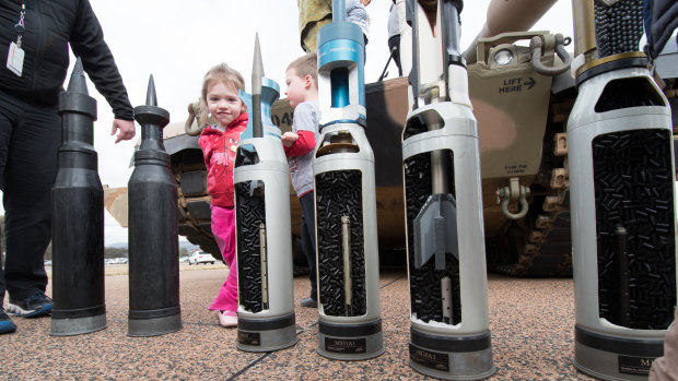 Children check out some of the Australian Army's equipment at a demonstration day on Friday.