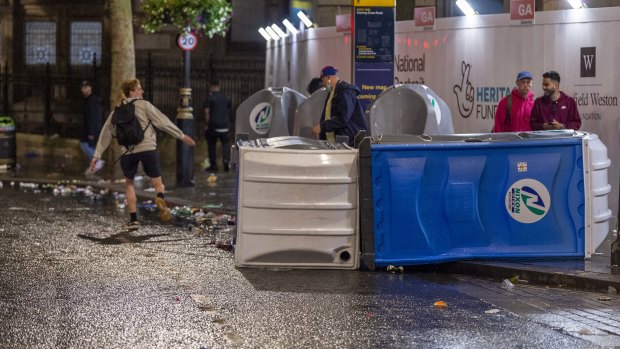 An upturned portaloo in Leicester Square after the Euro 2021 final.
