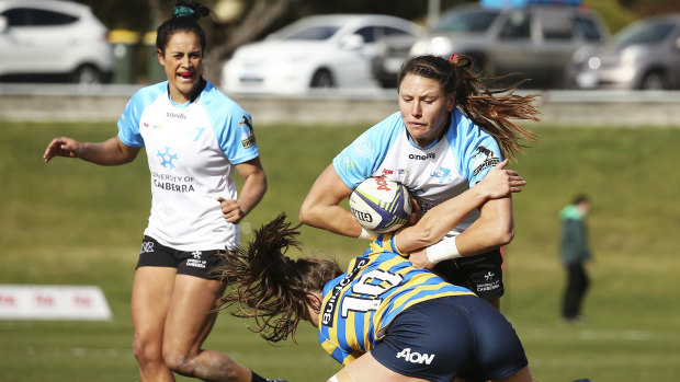 Canberra sevens player Abby Gustaitis in action.