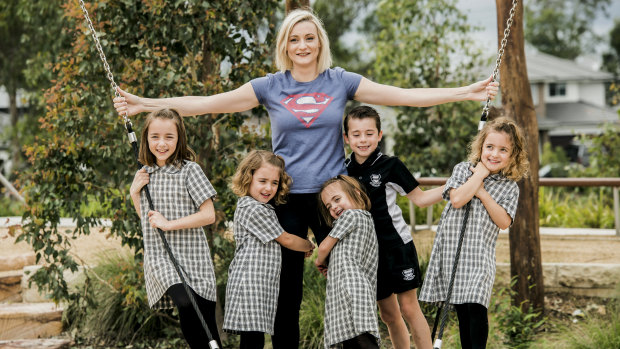 Star-Jade Reed, centre, has five children at Picton Public School, including triplets beginning kindergarten: (from left) Amelia, Evie, Isabella, Peter and Sophia.