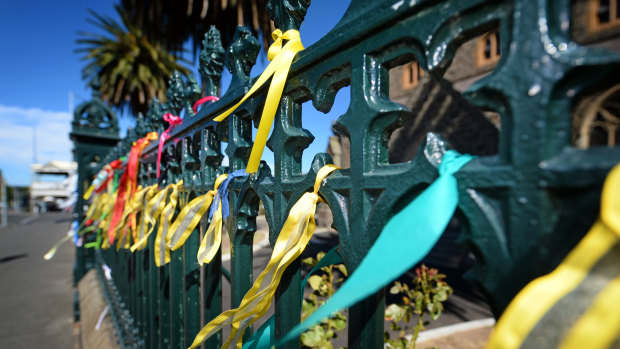 Abuse survivors have tied ribbons to the fences of many churches.