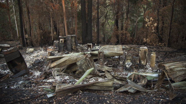 A destroyed home is seen one month after a bushfire swept through the region.