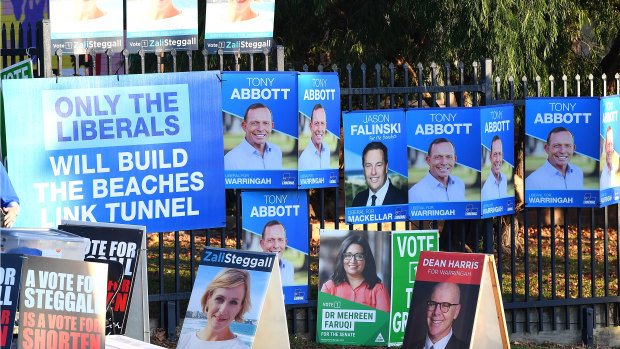 Posters in Warringah on election day.