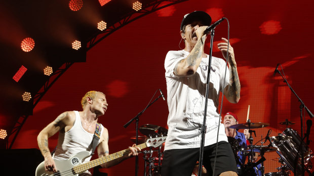 Bassist Flea, singer Anthony Kiedis and drummer Chad Smith from the Red Hot Chili Peppers perform at Rod Laver Arena on February 28, 2019 in Melbourne.