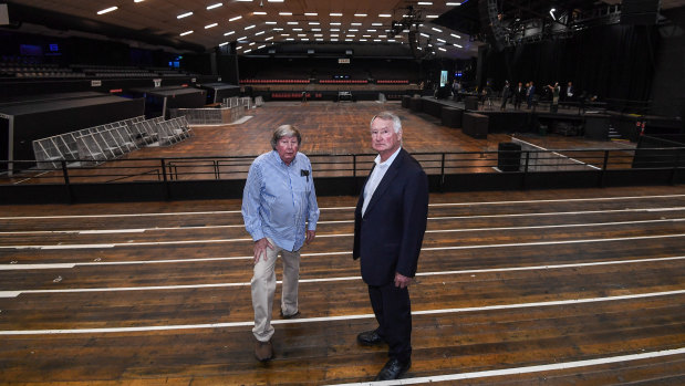 Interiors such as the timber floors and wooden bleachers, where Chris and John Wren are pictured standing, are deemed to be of cultural significance.