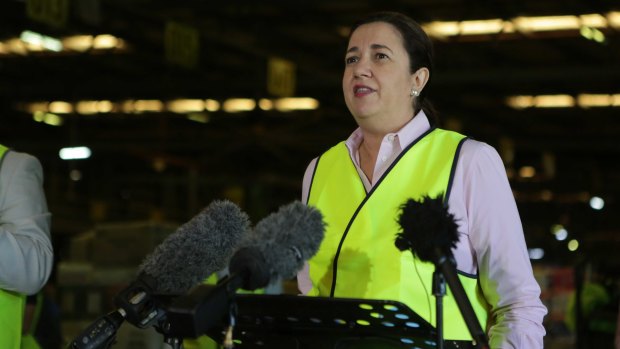 Premier Annastacia Palaszczuk gives a COVID-19 update at the Woolworths Brisbane Regional Distribution Centre at Larapinta on Monday.