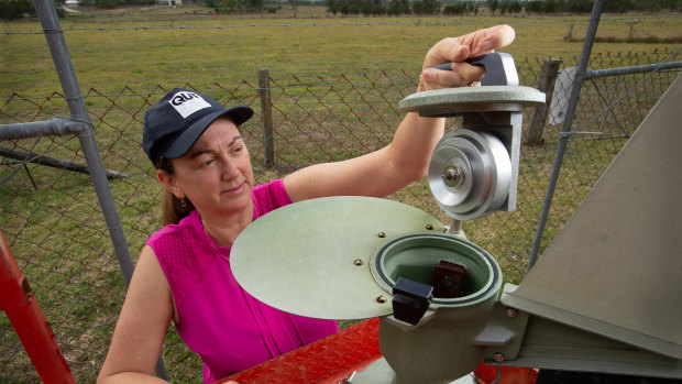 Professor Janet Davies collecting pollen from the pollen trap at Rocklea.