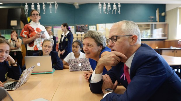 Then PM Malcolm Turnbull with Michelle Simmons (second from right) observing how a high-school class use computers. Turnbull championed tech innovation but after he was ousted his party dropped the idea. 