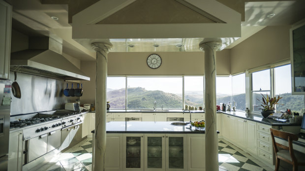 The Whitcome's kitchen overlooks the garden, pool and Murrumbidgee River