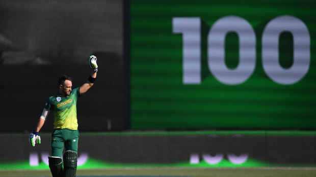 Ton up: South Africa's Faf du Plessis celebrates his century.