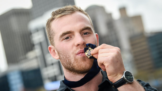 Tom Mitchell with his Brownlow Medal at Southbank on Tuesday morning.