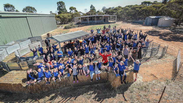 Murrayville Community College students pose for a photo in the school's sheep yard