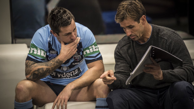 Mitchell Pearce with childhood hero Andrew Johns in Blues camp on Wednesday night.