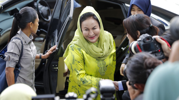 Rosmah Mansor (centre), wife of former Malaysian prime minister Najib Razak, arrives at the Anti-Corruption Agency for questioning.