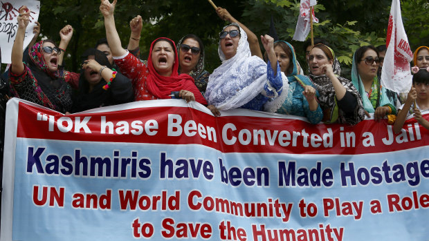 Supporters of Jammu Kashmir Islamic Political Party chant anti-India slogans at a demonstration.