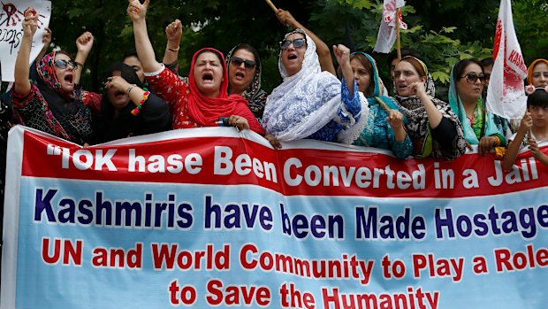 Supporters of Jammu Kashmir Islamic Political Party chant anti-India slogans at a demonstration.