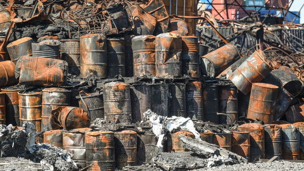 Burnt-out chemical drums after the fire at the West Footscray factory last year.