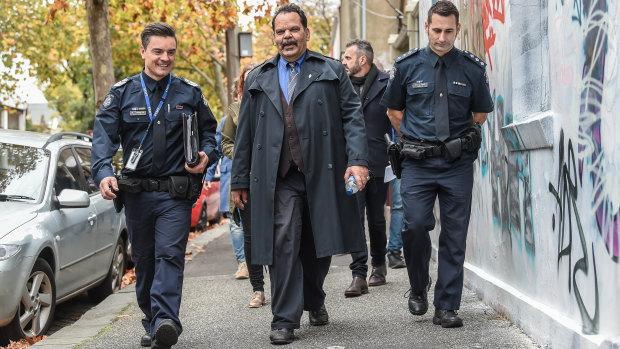 Jason Russell takes police officers for a walk through the streets of Fitzroy, where he used to be homeless. 