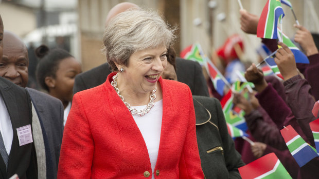 British Prime Minister Theresa May pictured in South Africa last week when trying to sell new trade deals with the UK.