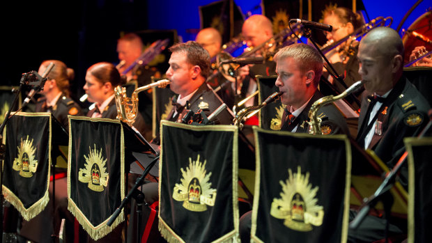 The saxophone section of the RMC band performing. 