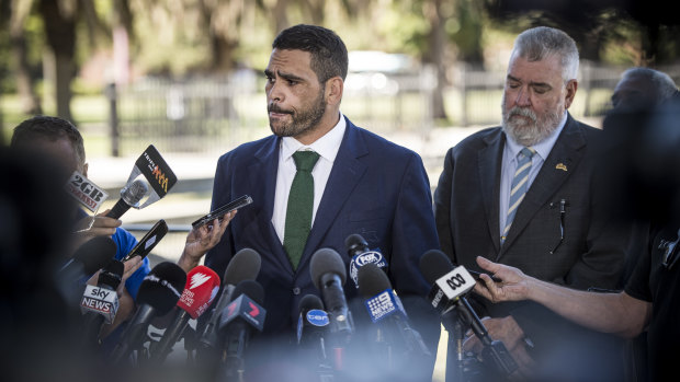 Mea culpa: Greg Inglis faces the press after being charged with drink driving and speeding.