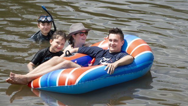 Canberra woman Michelle Love, pictured swimming at Casuarina Sands with her children Jazmin, 12, Axel, 6, and Jayden, 16, has welcomed a proposal for lifesavers to patrol the ACT's inland waterways.
