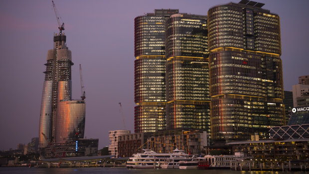 Crown's casino under construction (left) alongside Lendlease's International Towers at Barangaroo in Sydney.