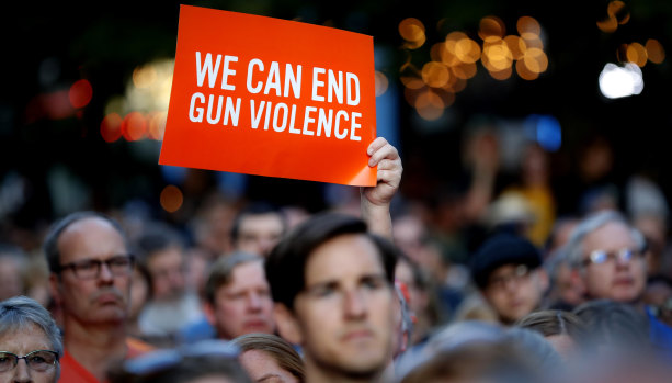 Mourners at a vigil in Dayton, Ohio, after the mass shooting there. 