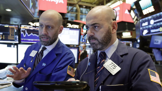 Wall Street slid lower on the Fed statement, but the S&P 500 finished only 0.5 per cent down.