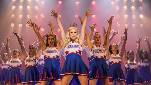 Kirby Burgess, front, leads the Truman cheerleaders.