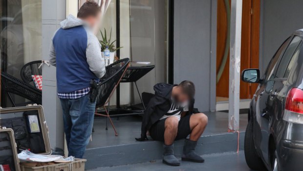 One of the men arrested during police raids on Wednesday morning.