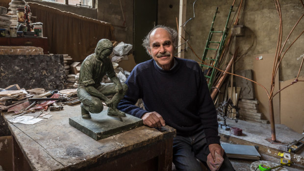 Sculptor Michael Meszaros with a maquette of his 1978 sculpture of John Pascoe Fawkner.