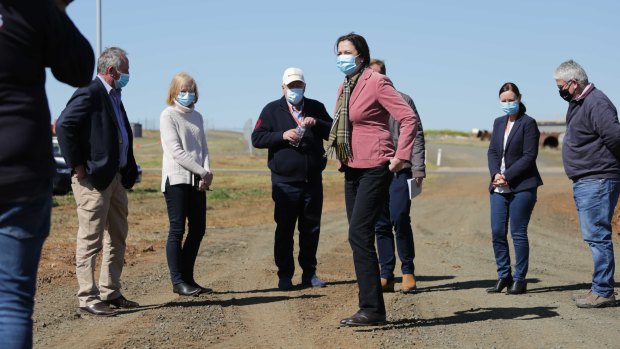 Queensland Premier Annastacia Palaszczuk (centre) inspects the site for the quarantine facility.