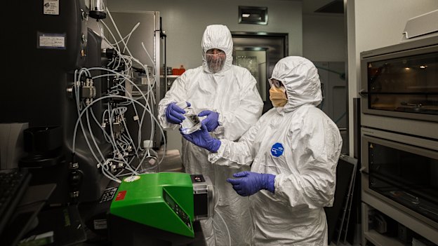 Professor George Lovrecz and Mylinh La at CSIRO's manufacturing facility for a pilot coronavirus vaccine in Clayton, Melbourne.
