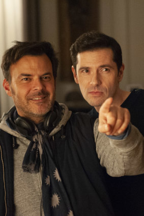 Director Francois Ozon (left) and actor Melvil Poupaud on the set of By the Grace of God.