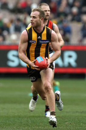 Ball on a string: Tom Mitchell was once again among the top five for Hawthorn after they held off the Bombers in a thriller at the MCG.