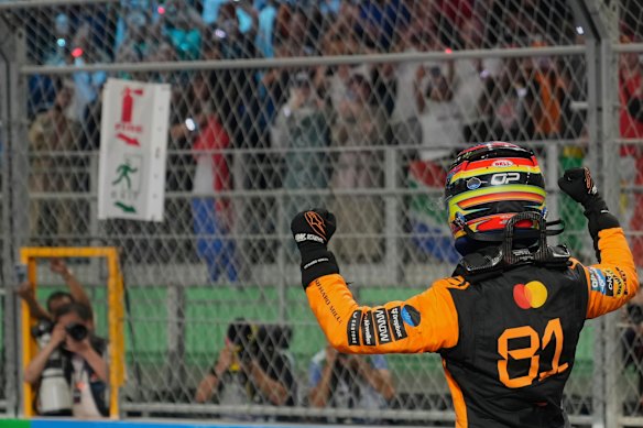 Oscar Piastri celebrates his win.