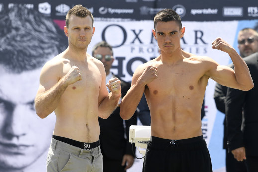 Jeff Horn and Tim Tszyu pose at Tuesday's weigh-in ahead of the fight at Townsville's Queensland Country Bank Stadium.